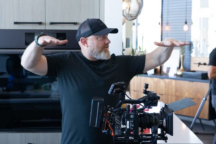 Director framing a shot with his hands