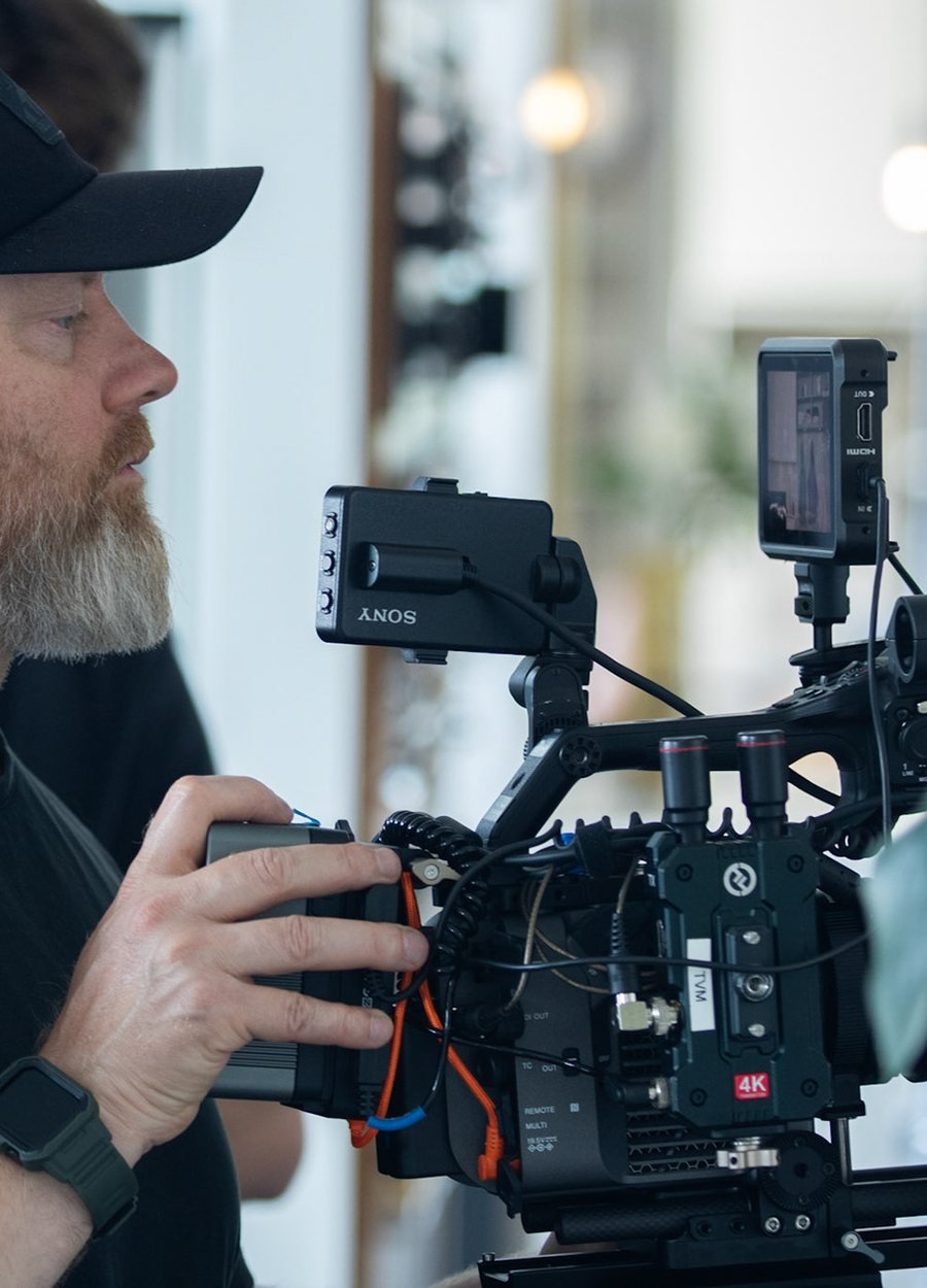 Volare Media camera operator on a Sony FX6 during a corporate shoot