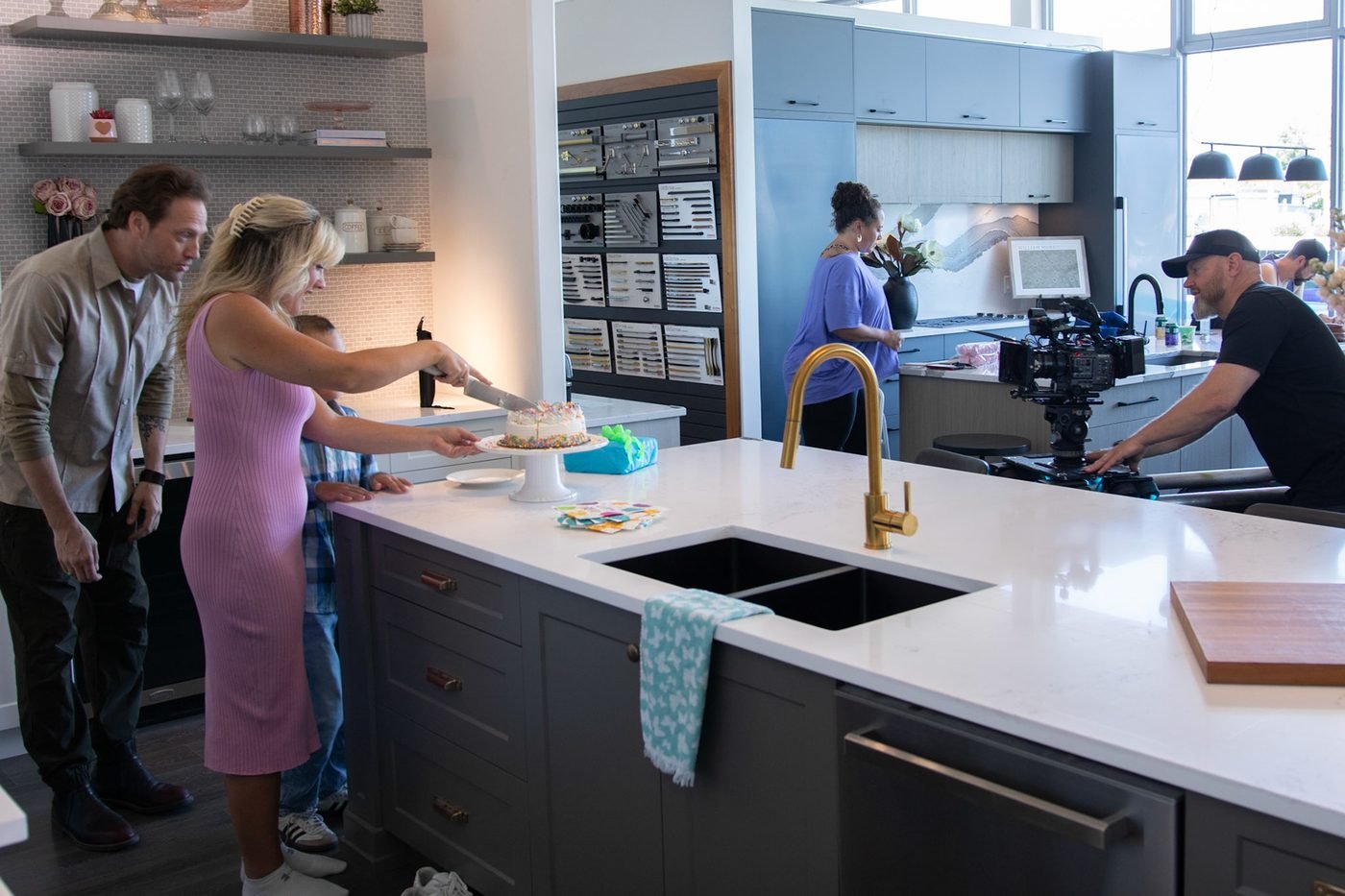 Volare Media crew filming inside a client's showroom