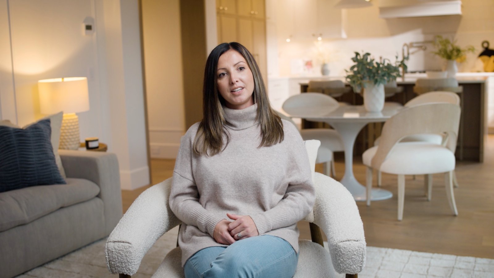 A client filmed for a website testimonial in her living room